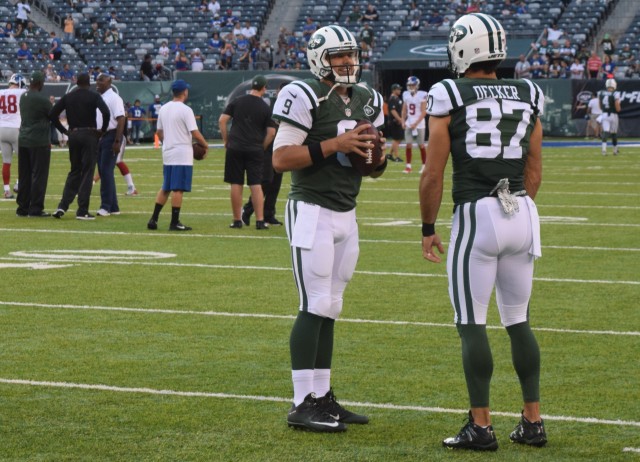 (Photo Credit: Barry Holmes) Petty and Decker sharing a conversation pregame.