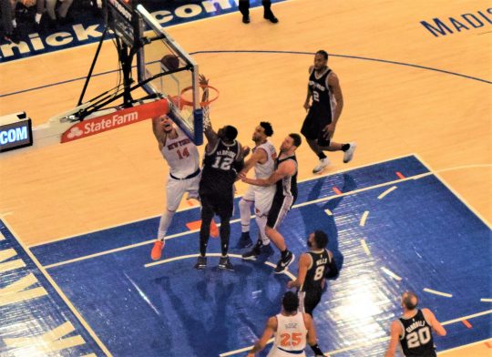 (Photo Credit: Barry Holmes) Hernangomez finishing a tough basket Sunday against the Spurs.