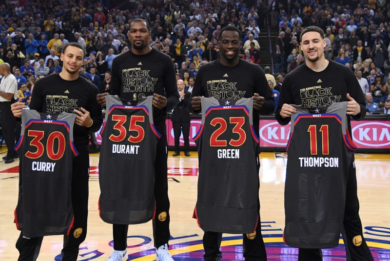 February 15, 2017; Oakland, CA, USA; Golden State Warriors guard Stephen Curry (30), forward Kevin Durant (35), forward Draymond Green (23), and guard Klay Thompson (11) pose with their All-Star jerseys before the game against the Sacramento Kings at Oracle Arena. Mandatory Credit: Kyle Terada-USA TODAY Sports