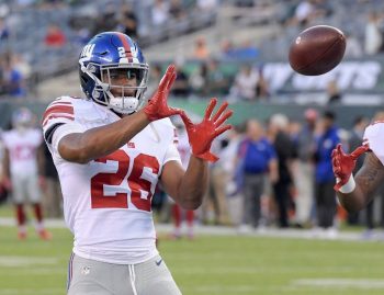 (Photo Credit: Bill Kostroun/AP) Barkley only played a few snaps in the Giants preseason opener.